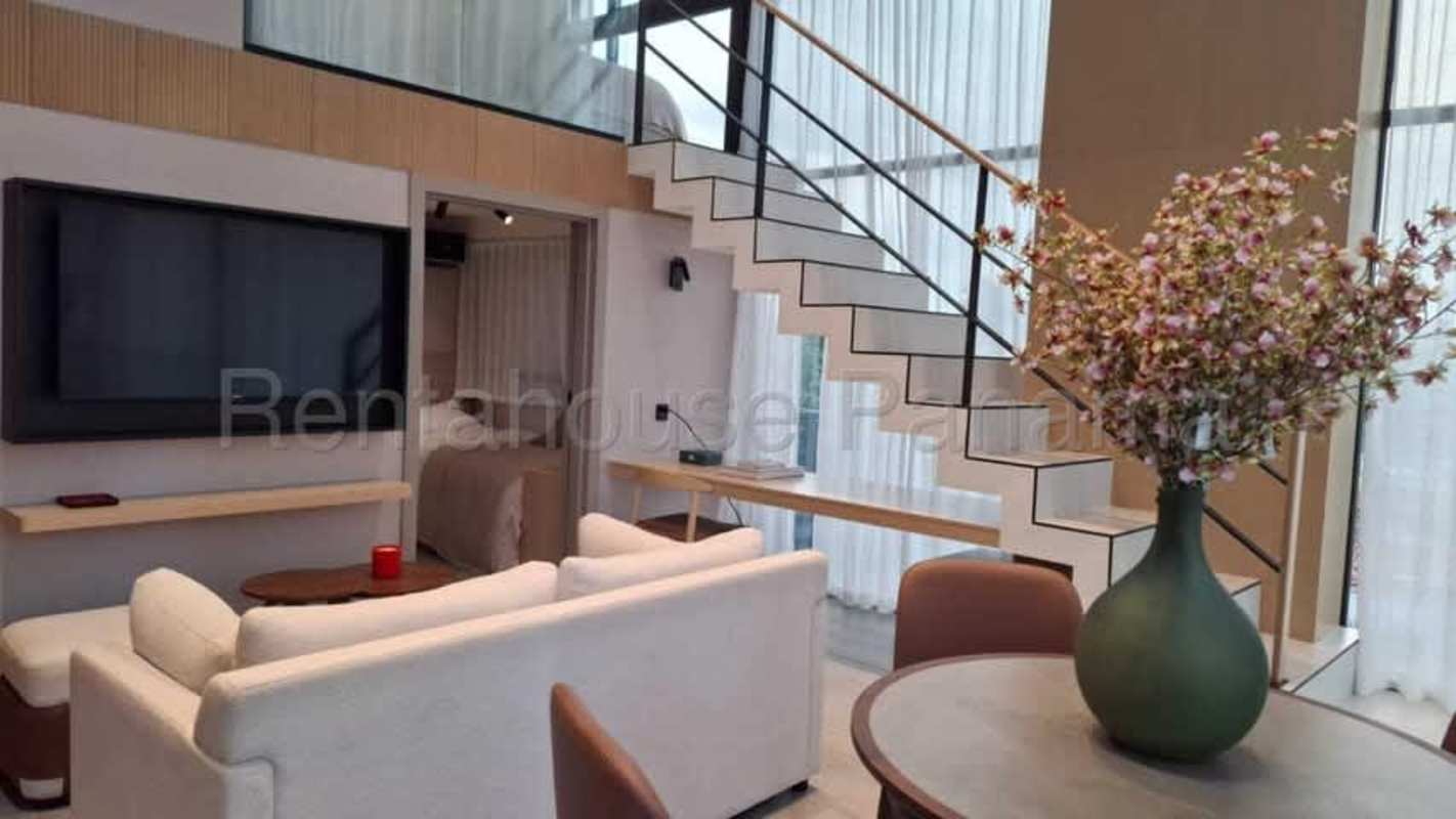 Open-plan kitchen with modern finishes connected to bright living space in PH Dovle Panama