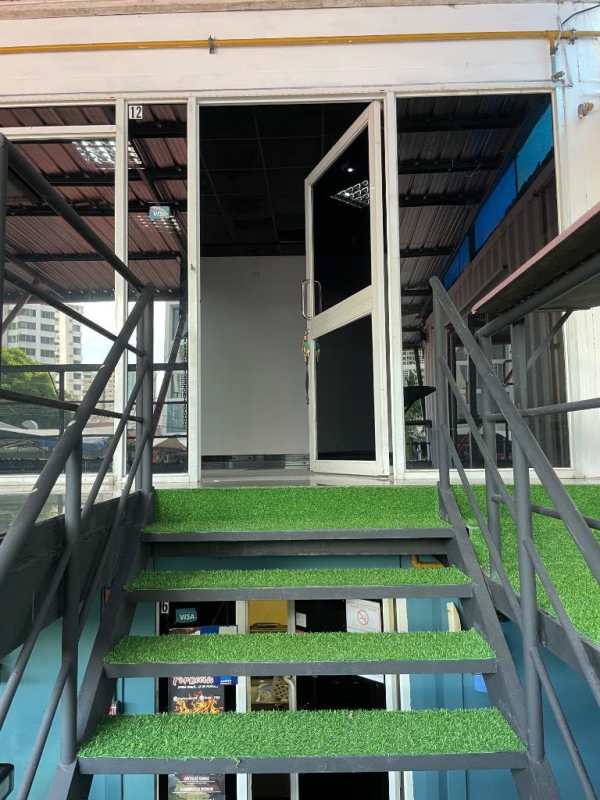 Covered balcony with view of parking area from Midpoint Plaza Panama City