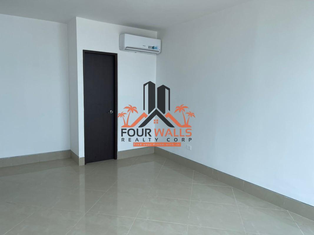 Outdoor pool area overlooking Panama City skyline at PH Colosal