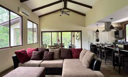 Colonial style living room with stone walls, natural light, open space Penonomé Coclé Panama