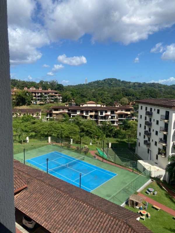 Embassy Village residential complex with tennis courts, landscaped gardens and Mediterranean-style buildings in Clayton Panama