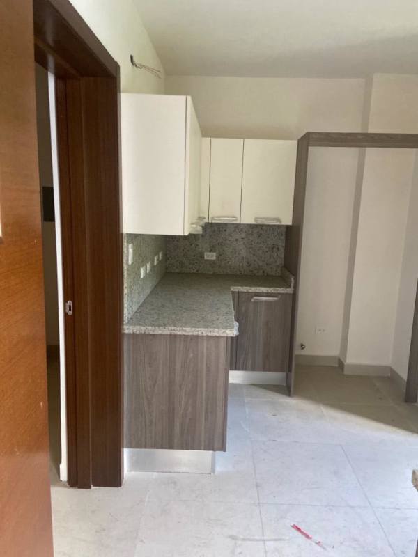 Secure gated main entrance palm trees Mediterranean-style Embassy Village Clayton Panama