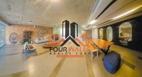 Modern lounge space with industrial design and BBQ area PH Explora