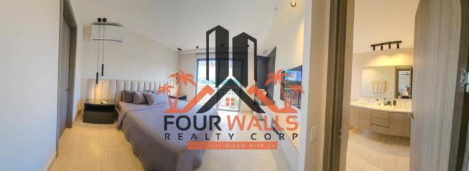 Modern master bedroom with attached bath and large window PH Explora