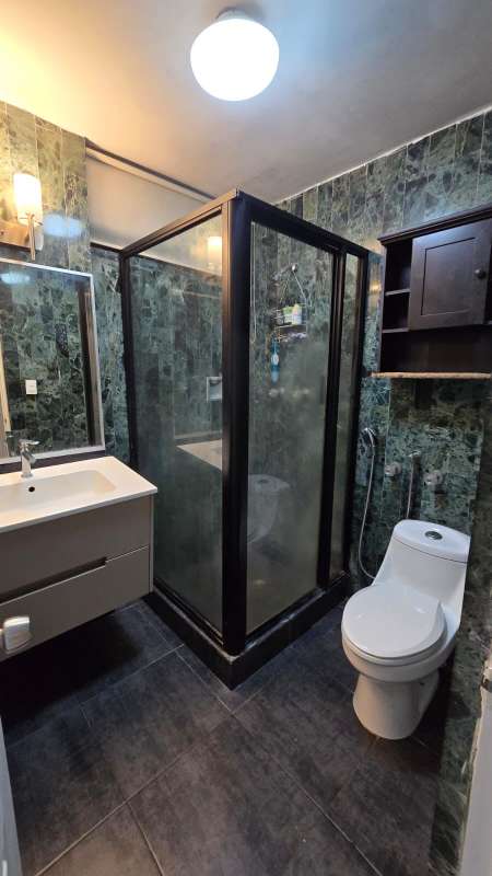 Apartment kitchen with granite counters, tiled backsplash, appliances at PH Viscaya Punta Paitilla Panama