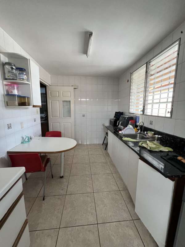 Kitchen interior with granite countertop dining area large windows Brisas del Golf Panama