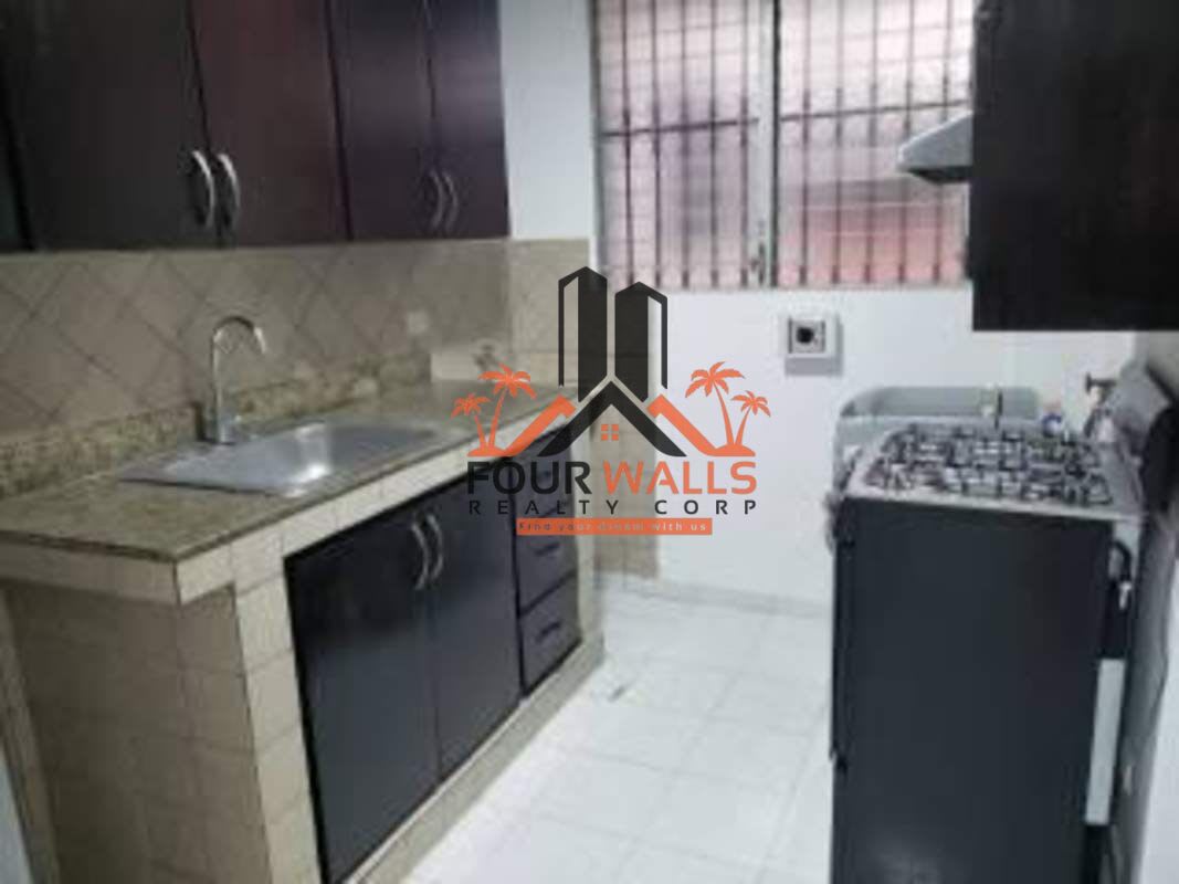 Bedroom featuring built-in closet and split AC at PH Altos de Bella Vista Panama City