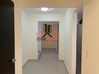 Contemporary open kitchen with modern cabinetry at Panama Pacifico rental house