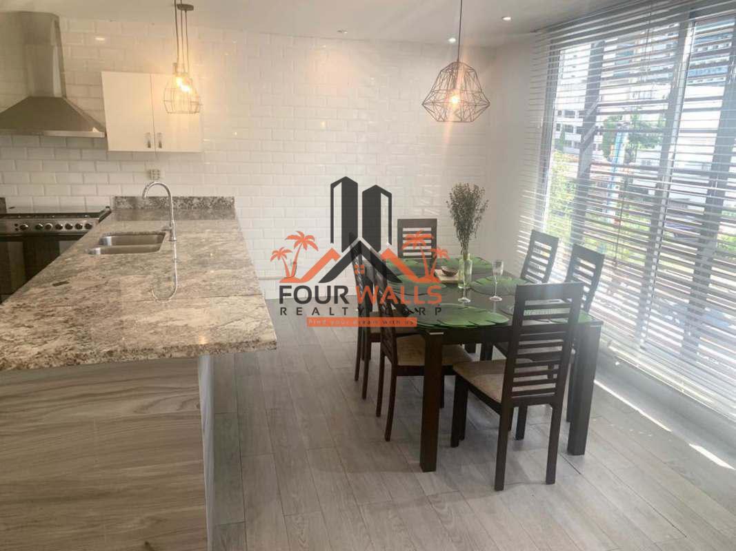 Open kitchen with granite countertops, stainless appliances PH Ultramar Plaza Marbella Panama City