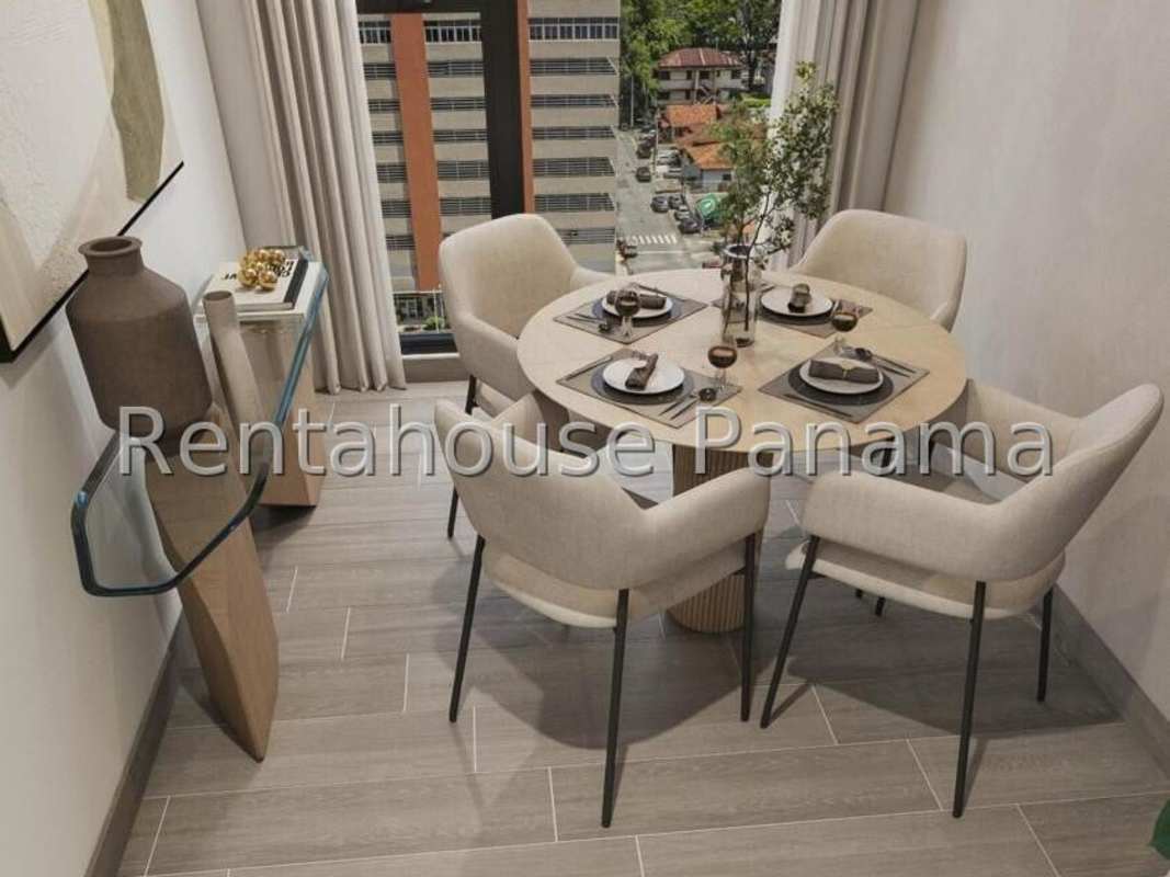 Bright bedroom with large window and city views in Bella Vista condominium Panama