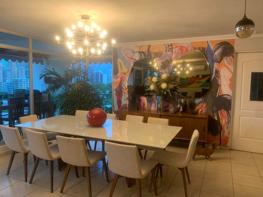 Living room with large windows, city views, and direct balcony access PH Andros Tower El Cangrejo Panama