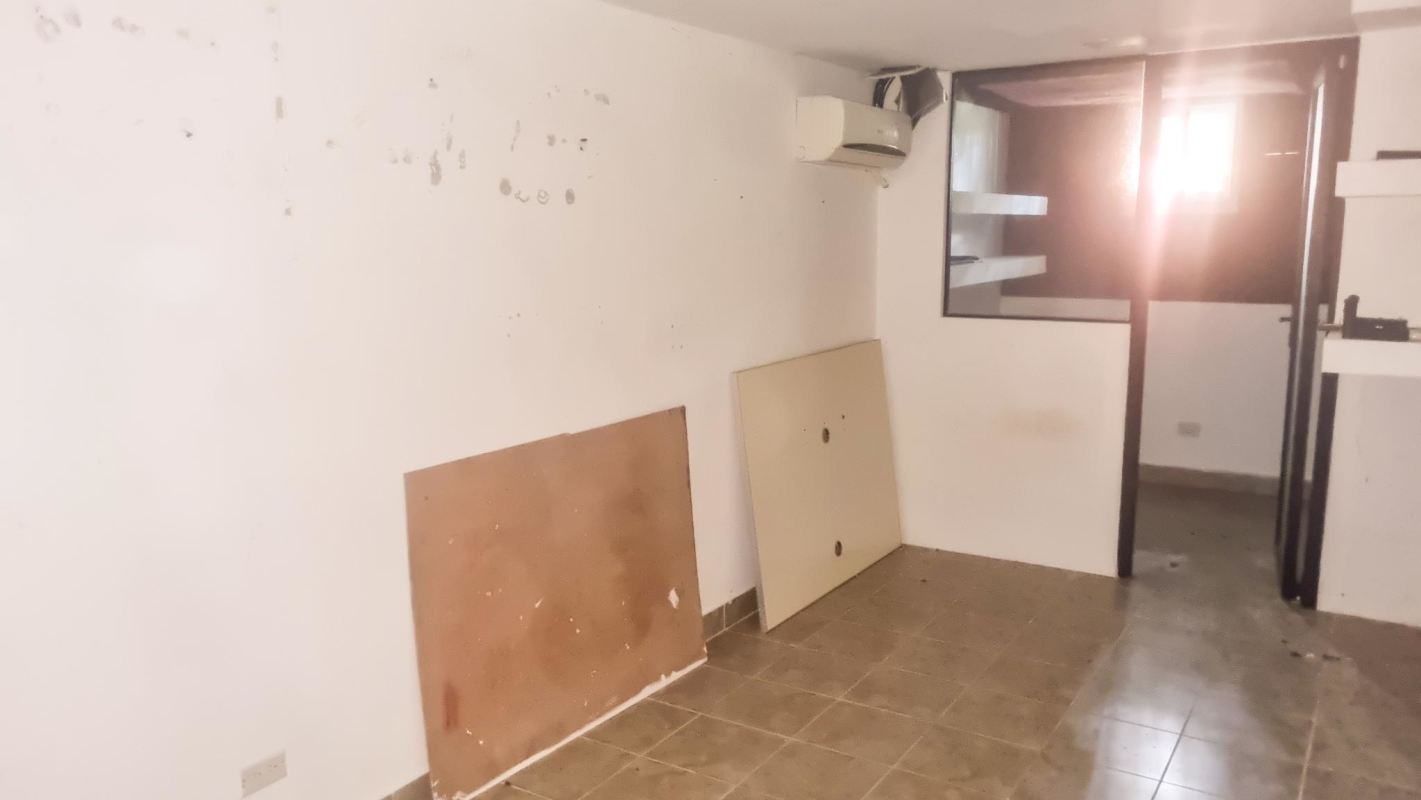 Unfinished basement or utility space in foreclosure house Residencial El Limajo Condado del Rey