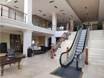 Spacious commercial interior with furniture arrangement mezzanine in investment property Panama