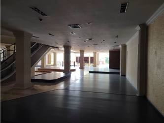 Contemporary large interior commercial space escalator open plan Panama Oeste