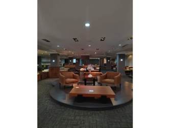 Retail plaza lobby double height with columns, lights, reception area Panama Oeste