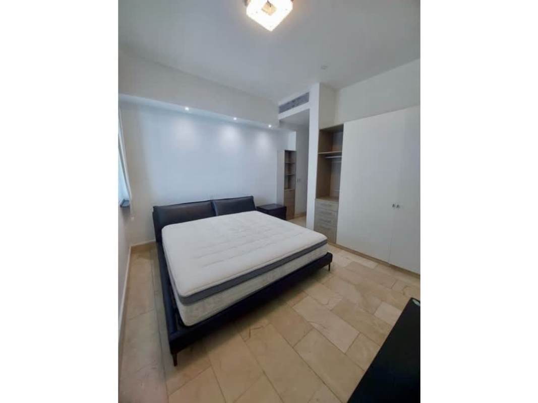 Luxury master bedroom with floor-to-ceiling Pacific views in Punta Pacifica Panama