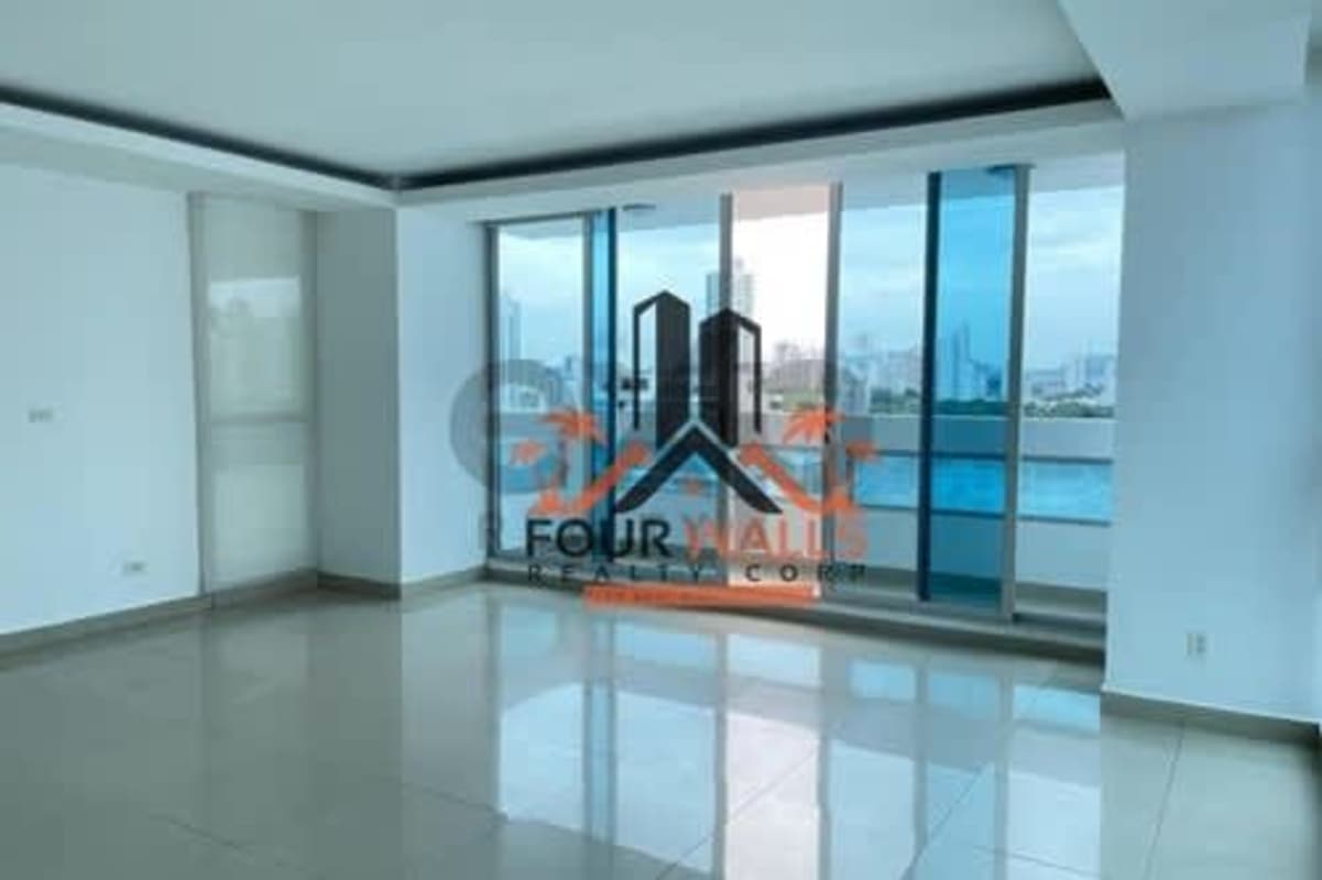 Large living space with floor-to-ceiling windows and balcony ocean view PH The View Panama