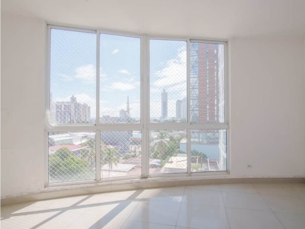 Bedroom with large window and walk-in closet city skyline view PH The Cosmopolitan Panama City