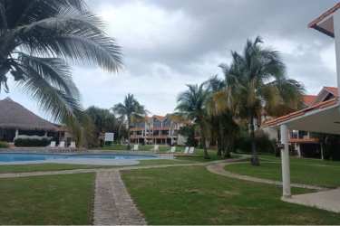 Resort-style tropical pool with palm trees in Brisas de Coronado Coronado Panama