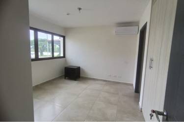 Bright bedroom with built-in closet, air conditioning and large window at Brisas de Coronado Coronado Panama