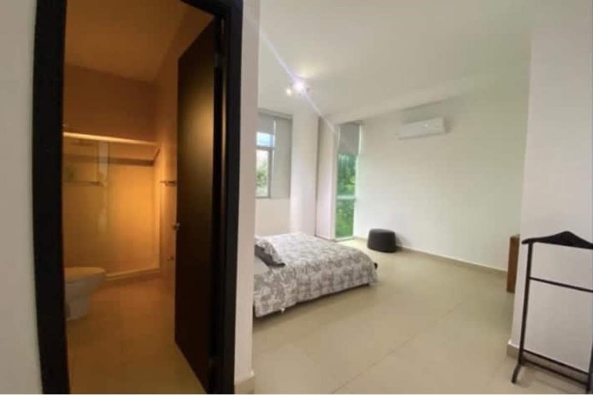 Luxury bathroom with double sink vanity and walk-in glass shower PH Bahía del Amador