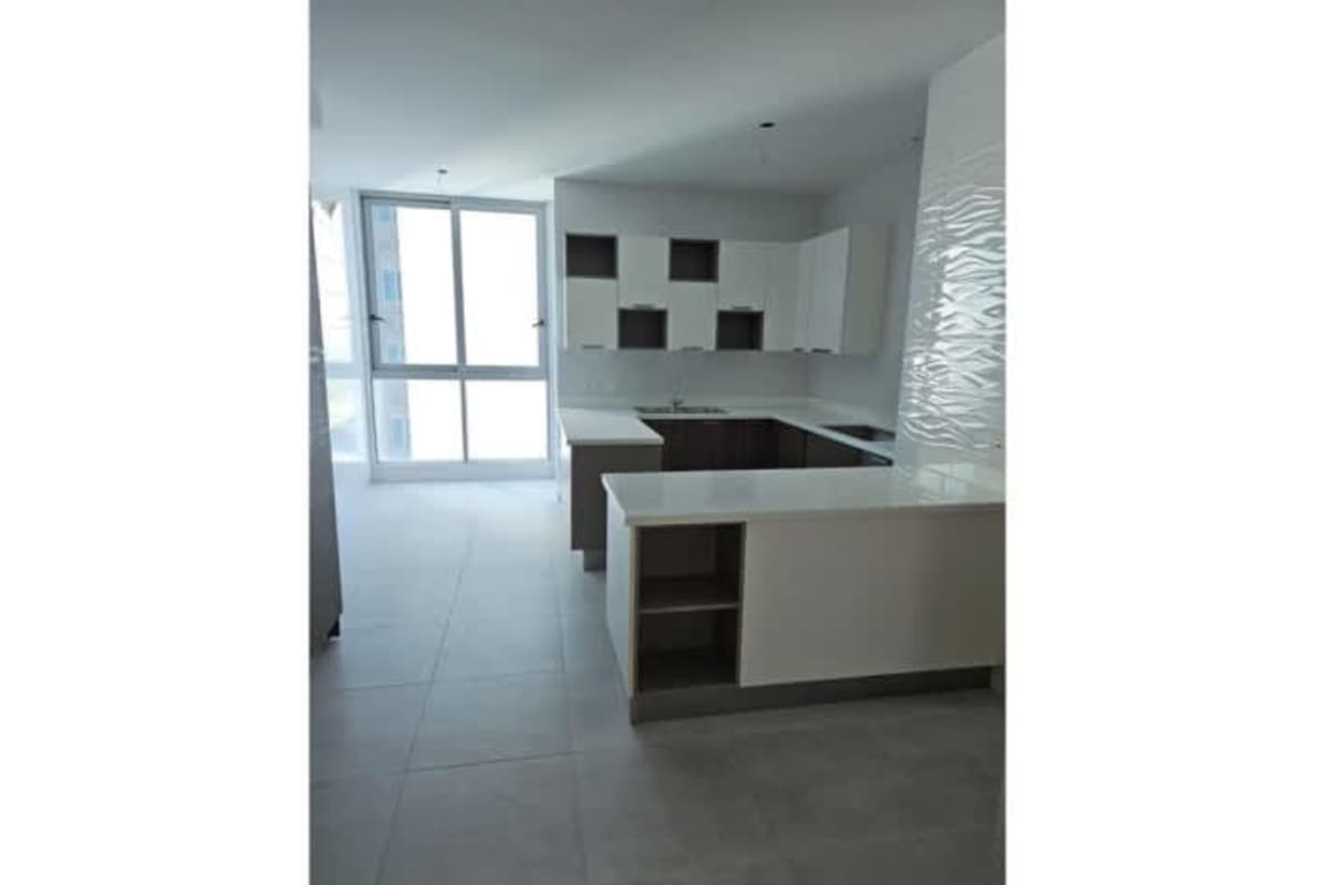 Spacious luxury apartment living room with marble floors and panoramic ocean views in PH Mirador Costa del Este Panama