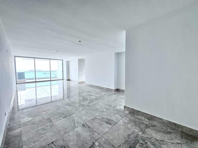 Kitchen with granite countertops, tile backsplash and stainless appliances at PH Bay View Avenida Balboa Panama