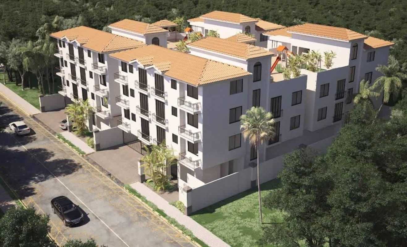 Aerial shot of new three-building complex with tiled roofs in Las Acacias Panama