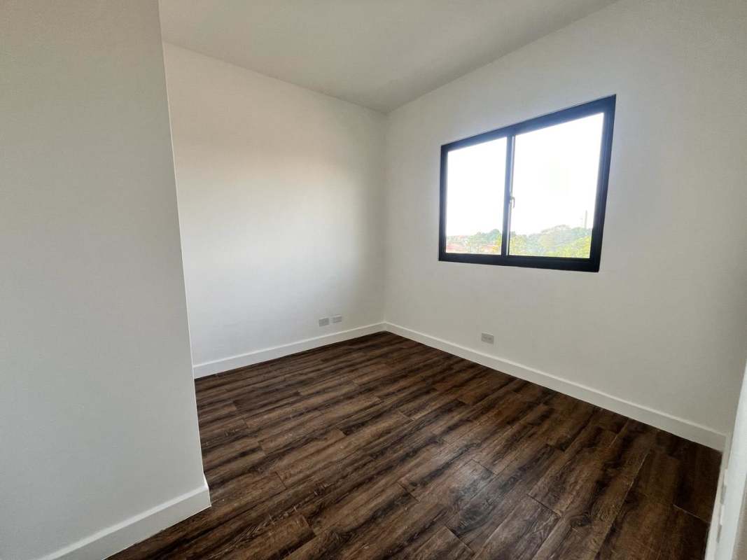 Close-up granite countertop kitchen bright light new Las Acacias apartment Panama