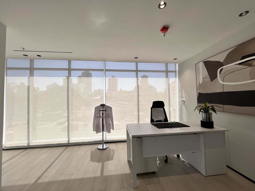 Modern lobby with elevators marble wall panels LED lighting Park Square Via España Panama City