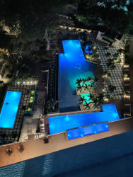 Multiple beachfront infinity pools overlooking ocean at PH Bahia Resort Panama