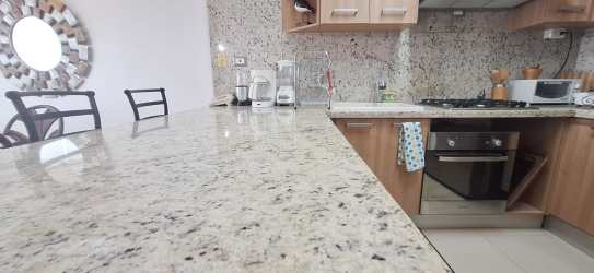 Modern bathroom with shower, decorative tile, vessel sink Bahia Resort Panama