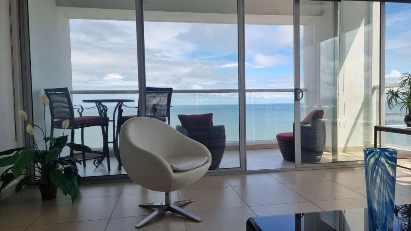 Luxury modern bathroom with freestanding bathtub, glass shower, large mirror in apartment PH BICSA Tower Panama City