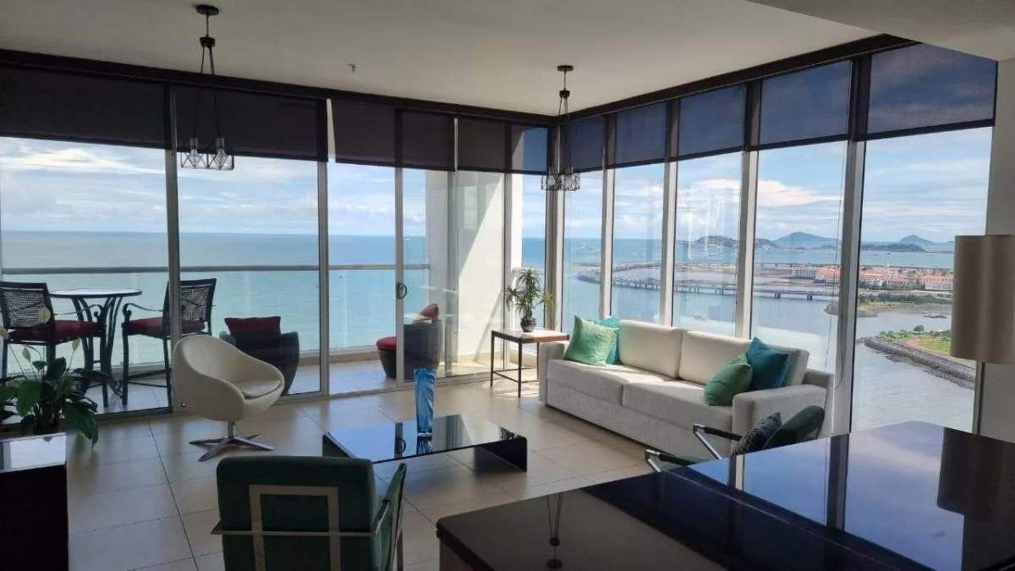 Private terrace with sweeping views of Pacific Ocean and Casco Viejo from luxury apartment in PH BICSA Tower Panama City