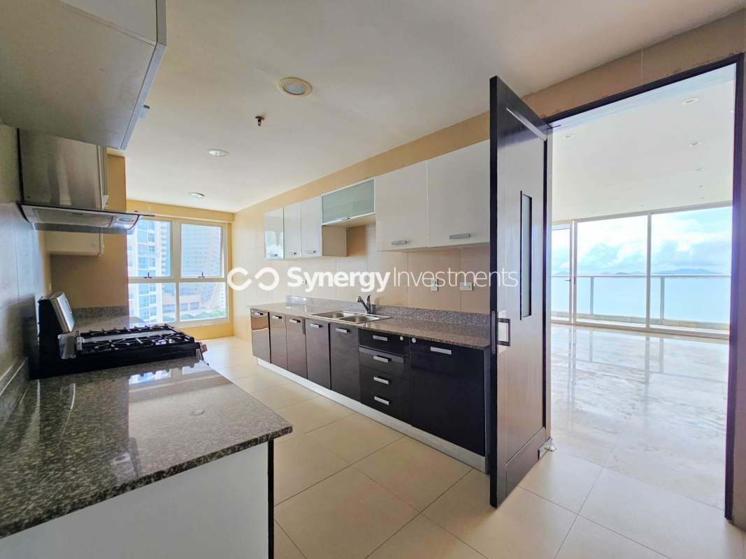 Spacious bright living room marble floors ocean view windows luxury Q Tower Panama City