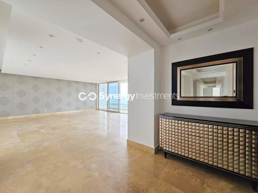 Spacious modern kitchen with granite countertops appliances and large windows ocean view - PH Q Tower Panama