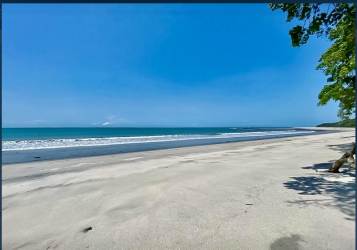 Wide sandy beach with gentle waves Pacific Ocean Playa La Ermita San Carlos Panama