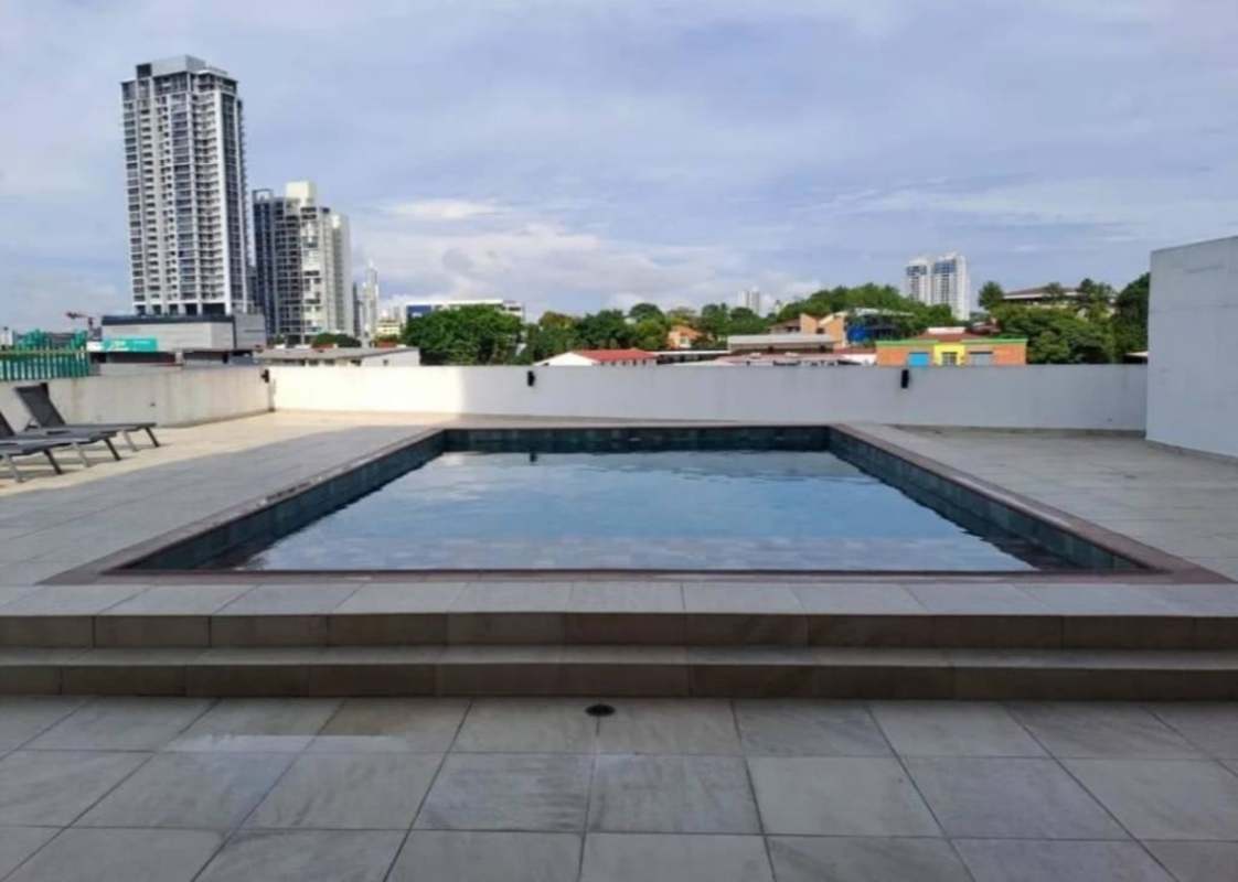 Modern gym with exercise equipment and natural light at PH Crystal Blue Panama City