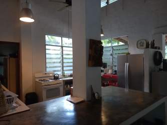 Ensuite bedroom in tropical style hostel hotel Playa Blanca Farallón