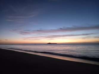 Covered outdoor dining terrace in hostel Playa Blanca Farallón Riviera