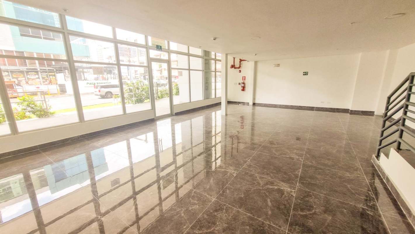 Modern commercial accessible ramp outside retail unit with city view Torre Comercial El Carmen Panama