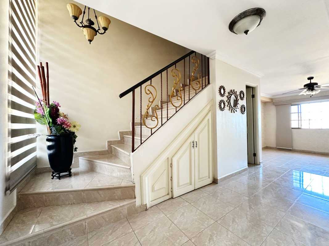 Dining room with large sliding doors, AC units, ceiling fan in house Urbanización Corona Garden Betania