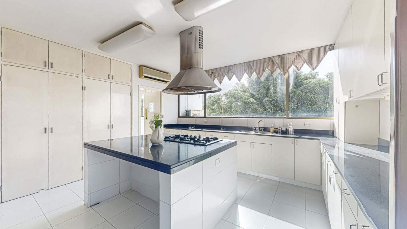 Expansive double living dining area with marble floors large windows at PH Torre Cerromar Bella Vista Panama