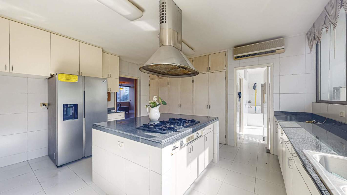 Home office with wood cabinets, shelves, large window, ceiling fan in PH Torre Cerromar Bella Vista Panama