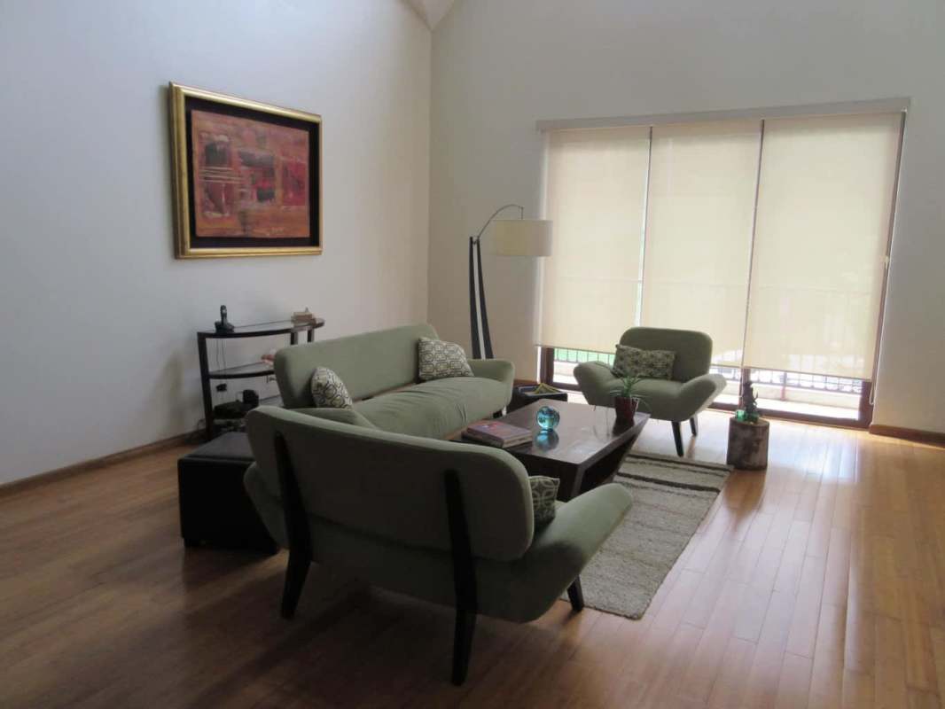 Open dining living area with high ceiling in loft Embassy Club Clayton Panama