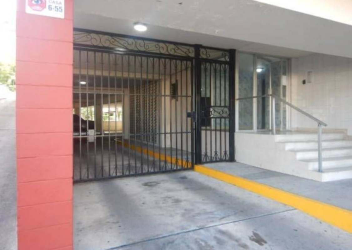 Elevator lobby corridor tiled walls stairs at PH El Paical in El Cangrejo Panama City