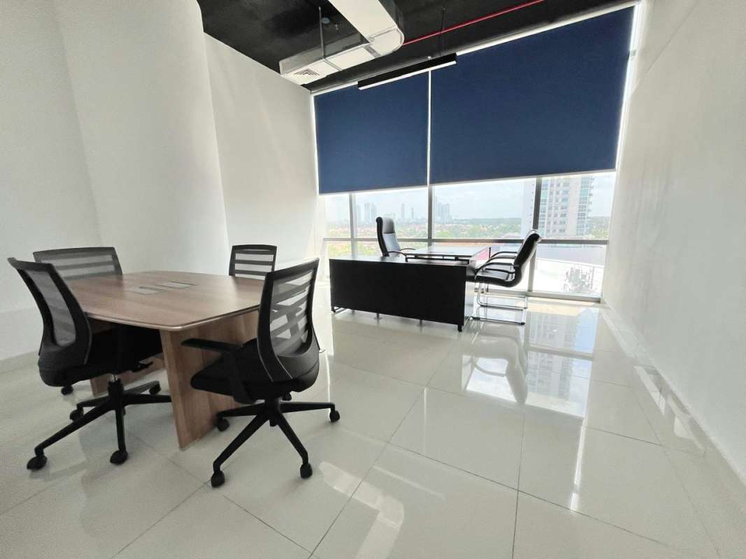 Modern glass-partitioned office interior in Costa del Este with tiled floors