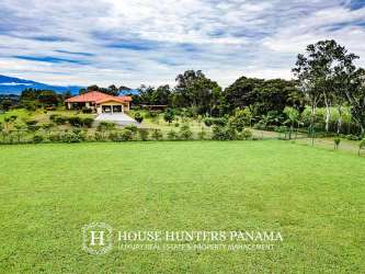 Mediterranean style house with large yard, garden and mountain backdrop in Chiriquí highlands Panama
