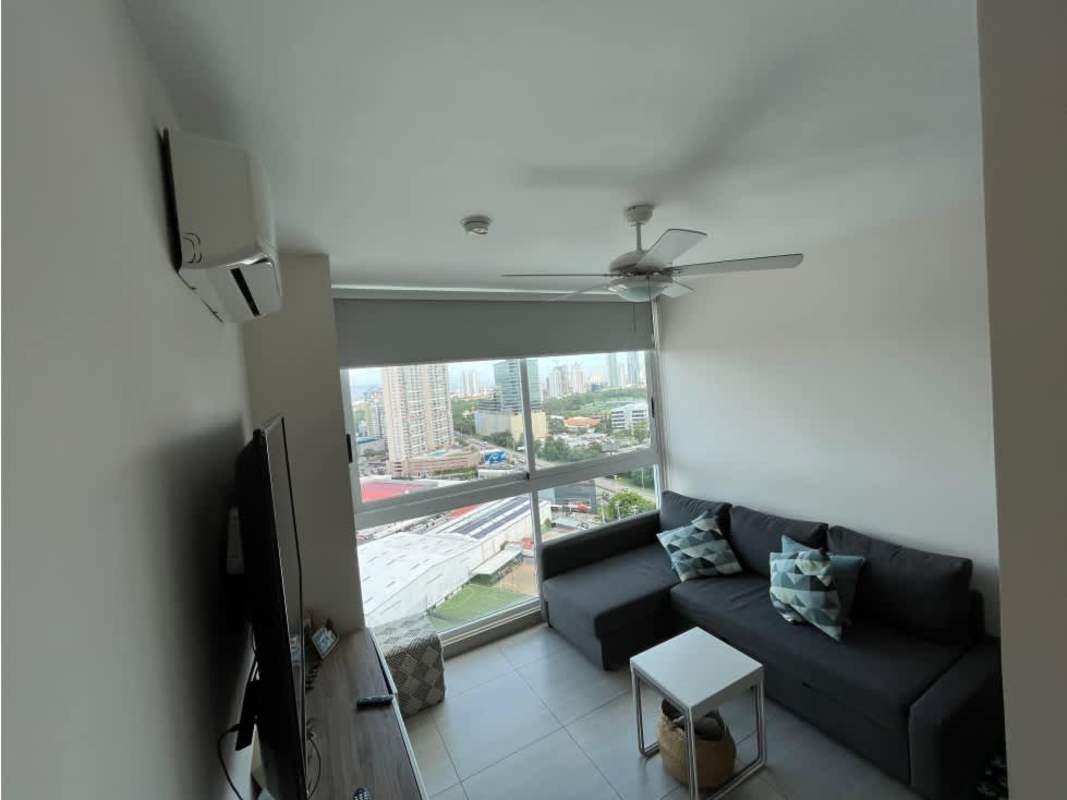 Modern galley kitchen with granite countertops, appliances, overhead cabinets in PH Asia Costa del Este Panama