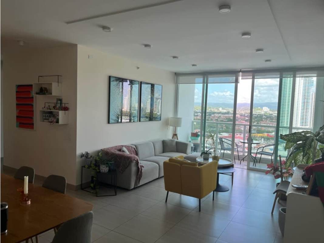 Spacious living room with floor-to-ceiling windows, balcony access, modern decor in PH Asia Costa del Este